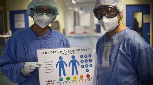 Doctors Jessica Garduno (L) and Luis Antonio Gorordo show the table designed by them to ease the ...