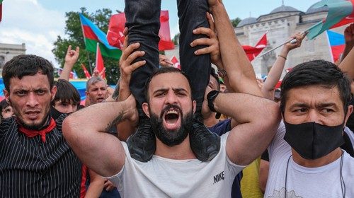 epa08554737 Ultra-nationalist Azerbaijani and Turkish people hold their national flags as they ... epa08554737 Ultra-nationalist Azerbaijani and Turkish people hold their national flags as they ...