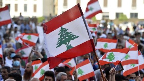 epa08552532 Anti-government protesters wave national flags during a protest called by member of ...