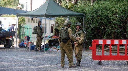 Israeli soldiers set up a check point on the Ghajar-Majdal Shams road by the Blue Line that ...