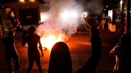 Protesters gather outside the Portland Police Bureau's North Precinct on the 101th consecutive night ... Protesters gather outside the Portland Police Bureau's North Precinct on the 101th consecutive night ...
