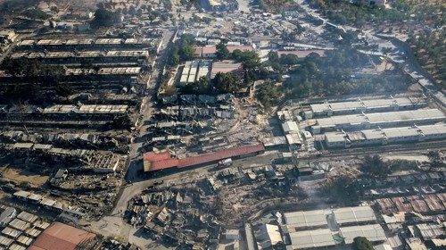 TOPSHOT - This aerial view taken on September 10, 2020, shows the burnt Moria refugee camp in the ...