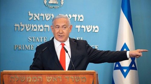 Israeli Prime Minister Benjamin Netanyahu gives a briefing on coronavirus developments in Israel at ...