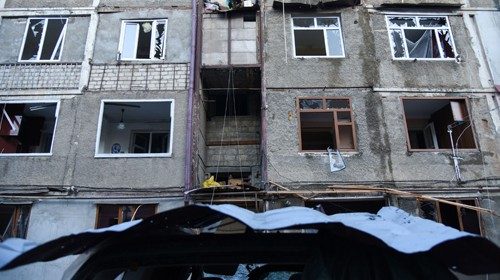 A view shows an apartment building that was allegedly damaged by recent shelling during a military ...