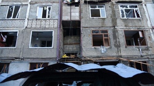 A view shows an apartment building that was allegedly damaged by recent shelling during a military ... A view shows an apartment building that was allegedly damaged by recent shelling during a military ...