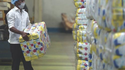 In this picture taken on October 1, 2020, a staff member works on the production line of a diaper ...