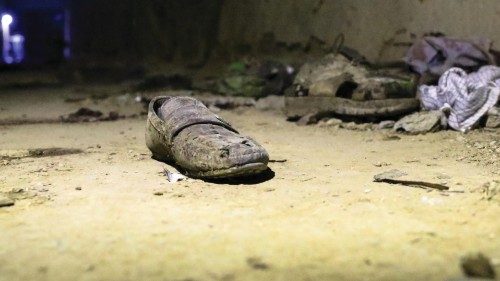 epa08770991 Belongings of the victims are seen on the ground at the scene of a suicide attack that ...