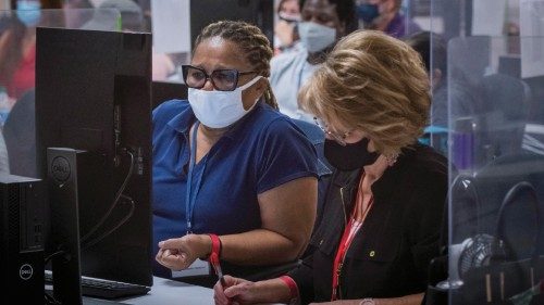 epa08802081 Adjudicators continue to check ballots at the Maricopa County Recorder's Office  ...