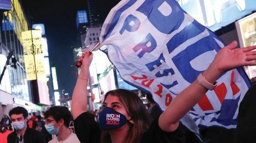 A woman reacts in Times Square after a speech by Democratic U.S. presidential nominee Joe Biden ...