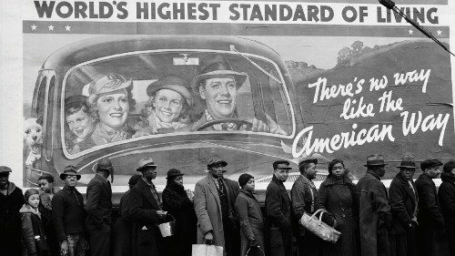 Famous image of African American flood victims lined up to get food and clothing from Red Cross ...