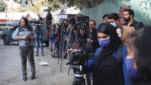epa08803897 Journalists gather at the scene of an explosion in Kabul, Afghanistan, 07 November 2020. ...