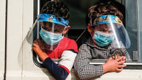 Palestinians school children, clad in masks and face-shields due to the COVID-19 coronavirus ... Palestinians school children, clad in masks and face-shields due to the COVID-19 coronavirus ...