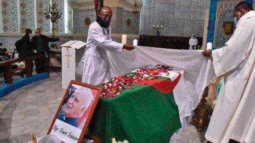 Priests prepare the coffin of late Algerian Archbishop Henri Teissier during a mass in his honour at ...