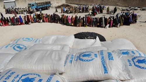 (FILES) In this file photo taken on August 15, 2011 Somali people living in nearby camps for ... (FILES) In this file photo taken on August 15, 2011 Somali people living in nearby camps for ...