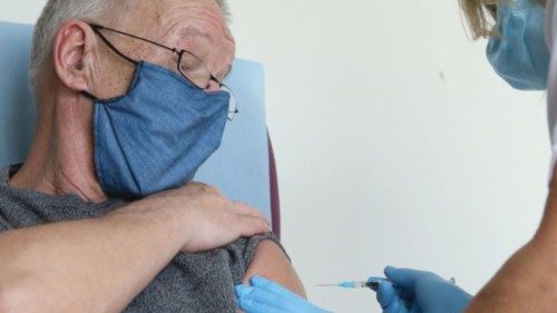 A nurse administers a dose of the Pfizer/BioNTech Covid-19 vaccine to a man in Ajaccio, on the ...