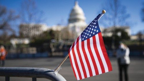 WASHINGTON, DC - JANUARY 09: An American flag flies at a makeshift memorial for U.S. Capitol Police ...