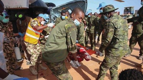 epaselect epa08935919 United Nations Mission in Mali (MINUSMA) personnel assist an injured ...