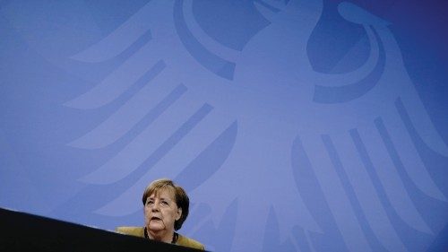 German Chancellor Angela Merkel attends a news conference after talks with state leaders at the ...
