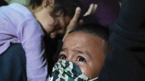 A boy cries as Honduran migrants heading to the border with Guatemala, march in the municipality of ...