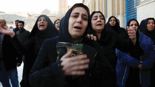 Women mourn during the funeral of a man who was killed in a twin suicide bombing attack in a central ...