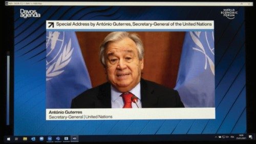 epa08964939 A screen shows the U.N. Secretary-General Antonio Guterres addressing his statement by ...