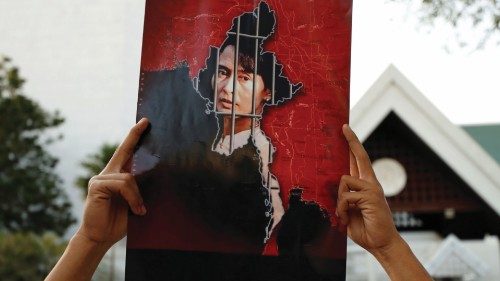 A Myanmar citizen holds up a picture of leader Aung San Suu Kyi after the military seized power in a ...