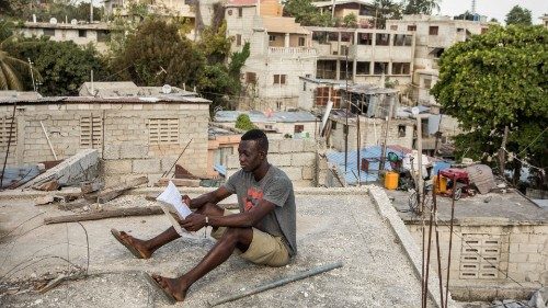 Kervens CassÃus, 20, studies on the roof of his uncle's house on February 18, 2021 in ...