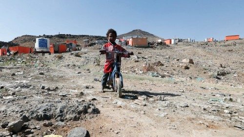 epa09045447 A displaced Yemeni child ride a bicycle at a camp for Internally Displaced Persons ...