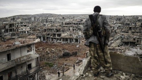 (FILES) In this file photo taken on January 30, 2015, Musa, a 25-year-old Kurdish marksman, stands ... (FILES) In this file photo taken on January 30, 2015, Musa, a 25-year-old Kurdish marksman, stands ...