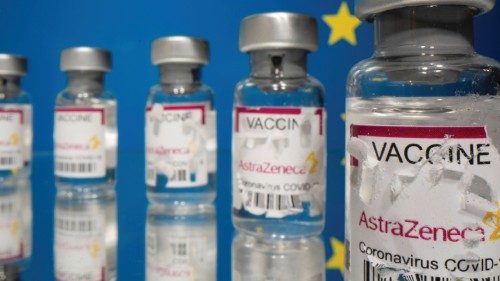 Vials labelled with partially torn sticker 'AstraZeneca COVID-19 Coronavirus Vaccine' are seen in ...