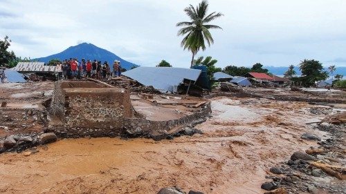 TOPSHOT - This picture taken on April 5, 2021 shows damaged homes after a flash flood in Waiwerang ...