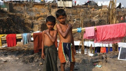 Brothers Mohammed Akter, 8, and Mohammed Harun, 10, both of whom were partially burnt in Myanmar ...