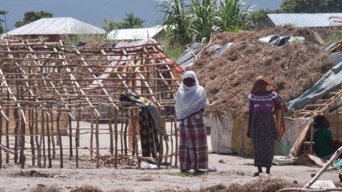 epa09110186 A handout photo made available by the World Food Programme (WFP) shows two women walking ...