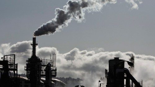 FILE PHOTO: Vapor is released into the sky at a refinery in Wilmington, California March 24, 2012. ...