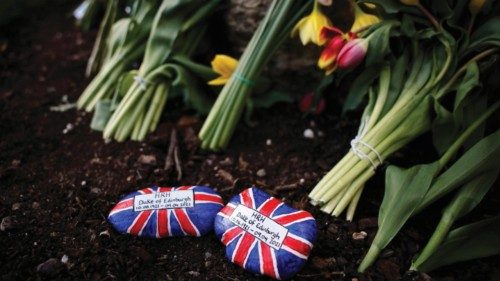 Painted stones left as a tributes are pictured outside Windsor Castle in Windsor, west of London, on ...