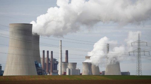 FILE PHOTO: Steam rises from the five brown coal-fired power units of RWE, one of Europe's biggest ...