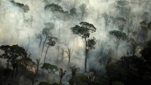 FILE PHOTO: Smoke billows from a fire in an area of the Amazon rainforest near Porto Velho, Rondonia ...