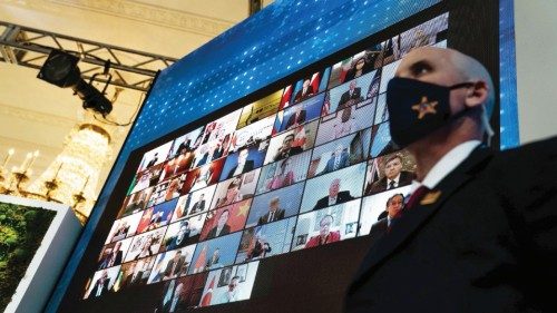 epa09155181 World leaders are displayed on a screen in the East Room of the White House during the ...