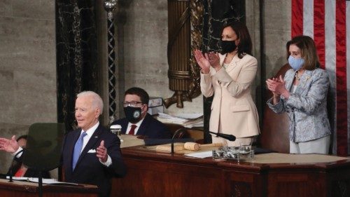 epaselect epa09166320 US President Joe Biden (L) delivers his first address to a joint session of ...