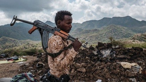 (FILES) In this file photo taken on December 09, 2020 A member of the Afar Special Forces stands in ...