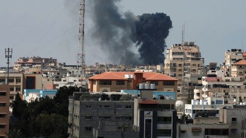 Smoke rises during an Israeli air strike, amid a flare-up of Israeli-Palestinian violence, in Gaza ...