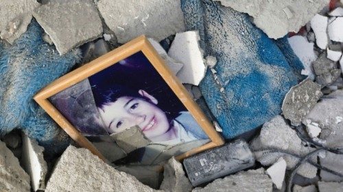 A picture is seen among debris inside a synagogue damaged by a rocket, as Israeli-Palestinian ... A picture is seen among debris inside a synagogue damaged by a rocket, as Israeli-Palestinian ...