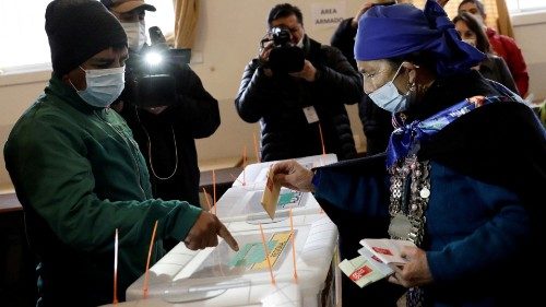 FILE PHOTO: Mapuche spiritual authority and constituent candidate Francisca Linconao casts her vote ... FILE PHOTO: Mapuche spiritual authority and constituent candidate Francisca Linconao casts her vote ...