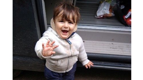 The 18-month old Iranian migrant boy Artin Irannezhad reacts, in Dunkirk, France, October 17, 2020, ...