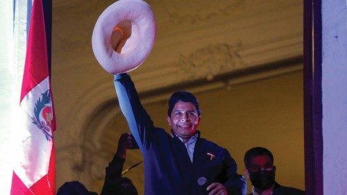 TOPSHOT - Peru's left-wing presidential candidate Pedro Castillo of the Peru Libre party, gestures ...