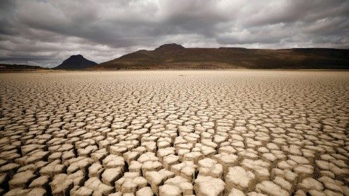 FILE PHOTO: Clouds gather but produce no rain as cracks are seen in the dried up municipal dam in ...