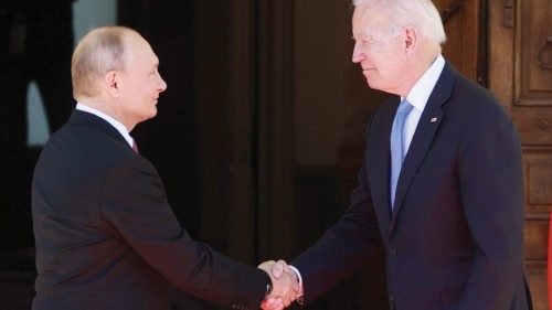 epa09276141 US President Joe Biden (R) and Russia's President Vladimir Putin (L) meet during the ...