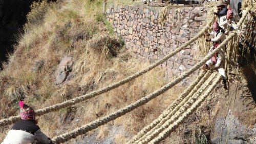 Members of the Huinchiri community rebuild an Incan hanging bridge, known as the Qeswachaka bridge, ...