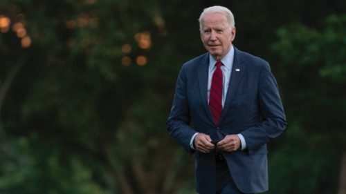 epa09299897 US President Joe Biden walks along the South Lawn from Marine One to the White House in ...