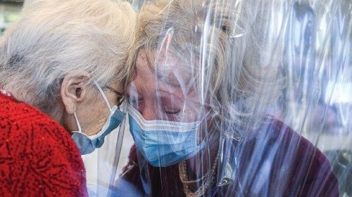 A resident (L) of the Domenico Sartor nursing home in Castelfranco Veneto, near Venice, hugs her ...